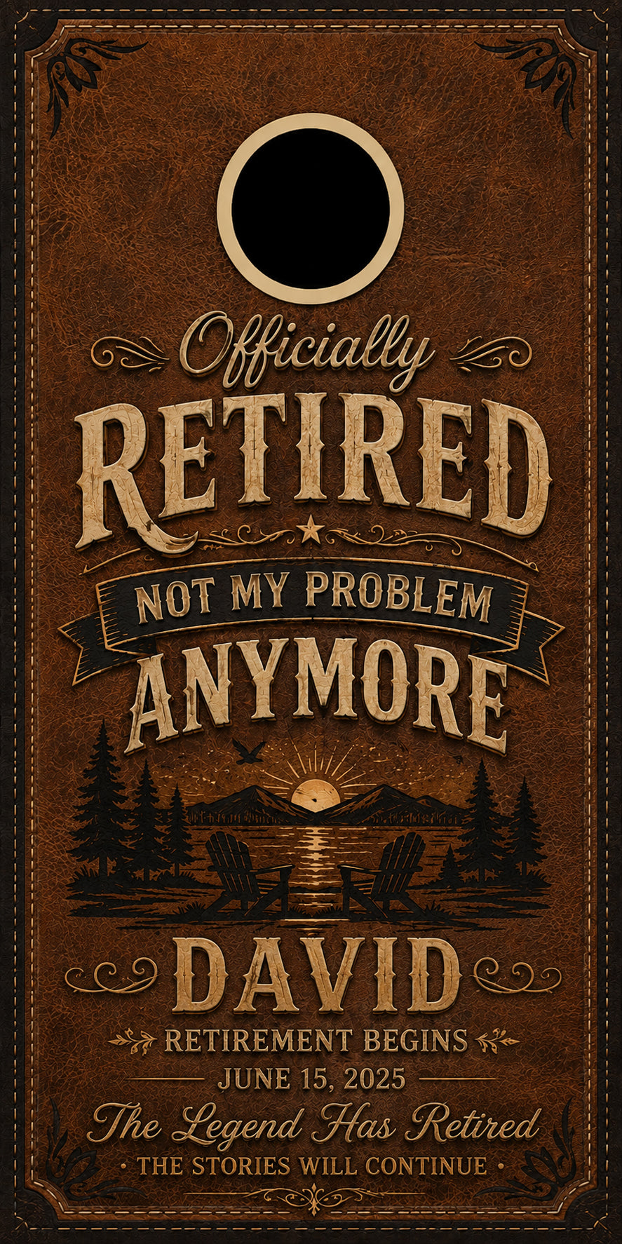 A square brown leather-look retirement sign or print with decorative typography reading 'Officially RETIRED NOT MY PROBLEM ANYMORE' and 'DAVID', plus a black circular cutout near the top and a scenic forest sunset illustration near the bottom.