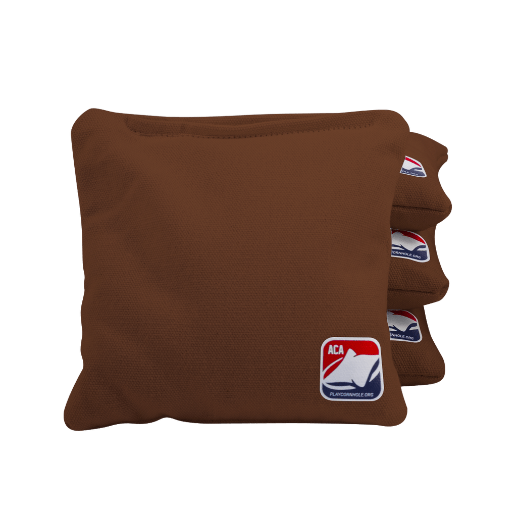 Brown cornhole bags with ACA logo on a transparent background