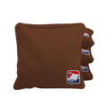 Brown cornhole bags with ACA logo on a transparent background