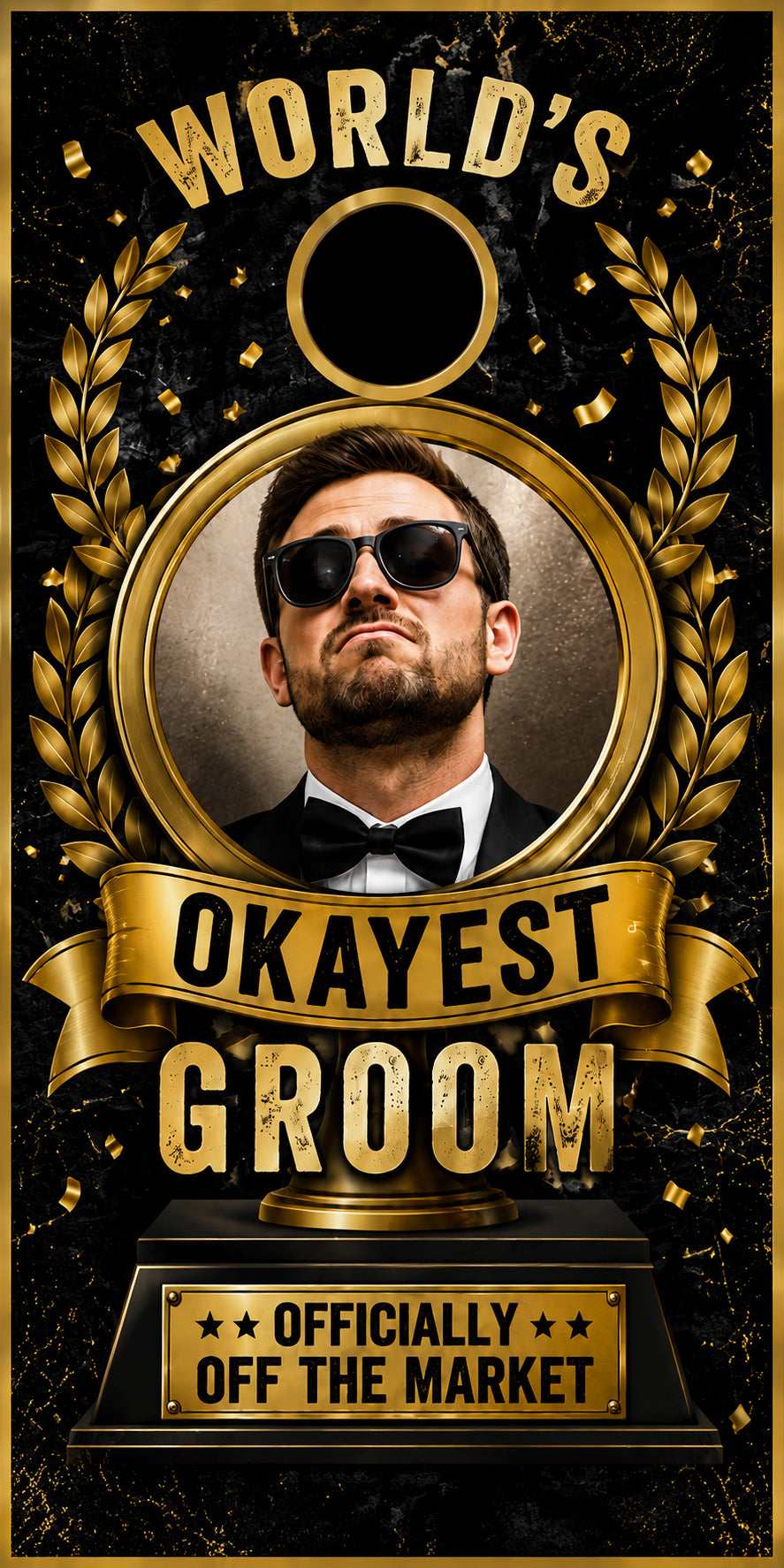 A promotional graphic for a novelty trophy or plaque reading 'WORLD'S OKAYEST GROOM' with a portrait of a man in sunglasses and a bow tie, gold laurel details, and text including 'OFFICIALLY OFF THE MARKET' on a black background.